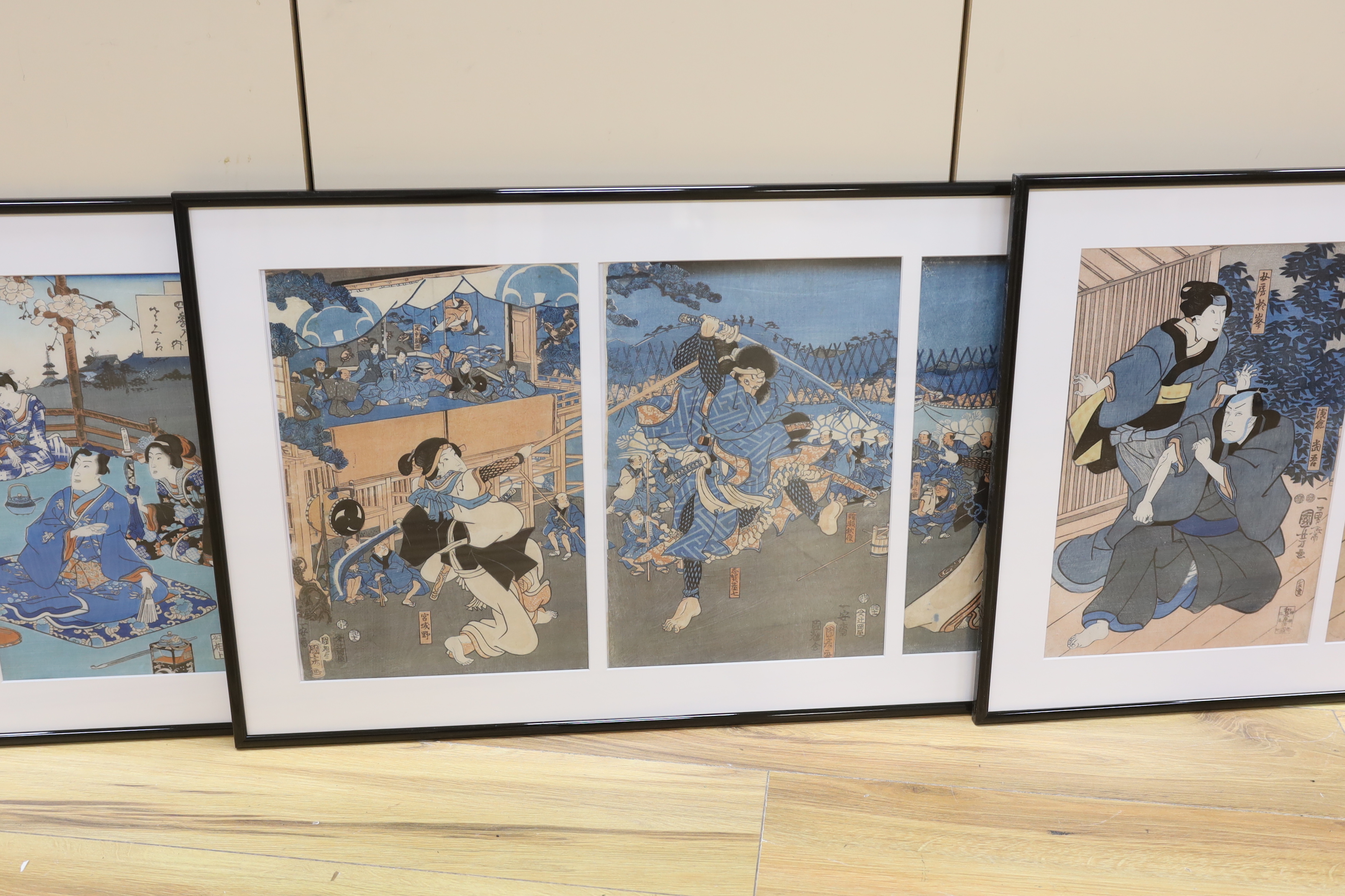 A set of three Japanese triptych woodblock prints, including after Kuniyochi (1798-1861), scene of Kabul, and after Kuni Sada (1786-1865), Shi Kino Uchi Sakura, largest overall 75cm x 35cm